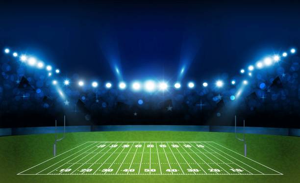 istock American football arena field with bright stadium lights design. Vector illumination 1011792430