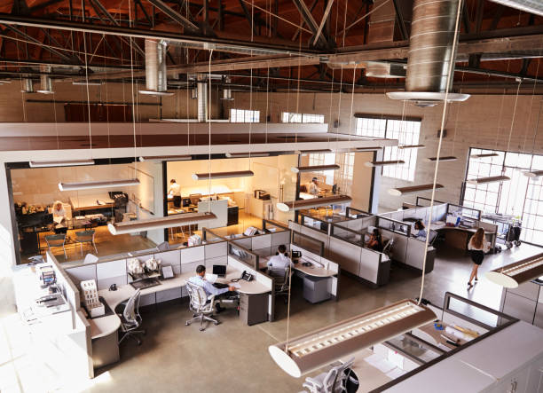 istock Elevated view of a busy open plan office 1011792744