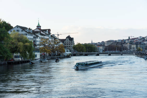 istock Zurich City Panorama with limmat river and small cruise ship 1011793208