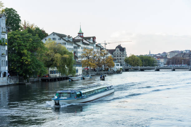 istock Zurich City Panorama with limmat river and small cruise ship 1011793244