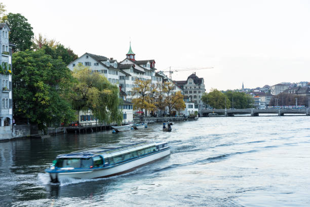 istock Zurich City Panorama with limmat river and small cruise ship 1011793294