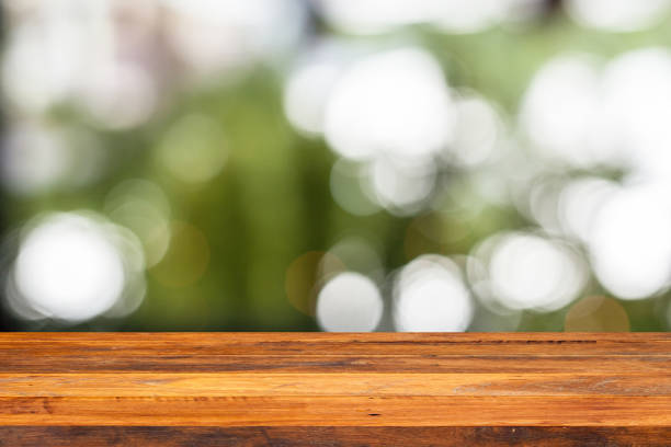 Empty wood Shelf on green bokeh background