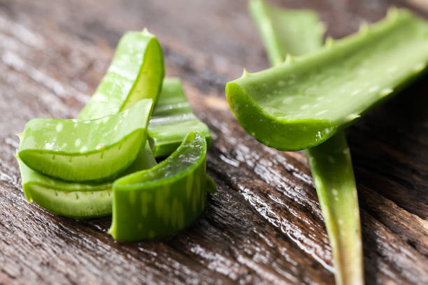 istock Slice Aloe Vera on a wooden background 1011795892
