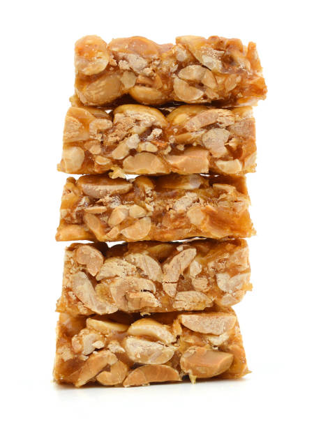 istock peanut in a sugar syrup (caramel) on a white background 1011796054