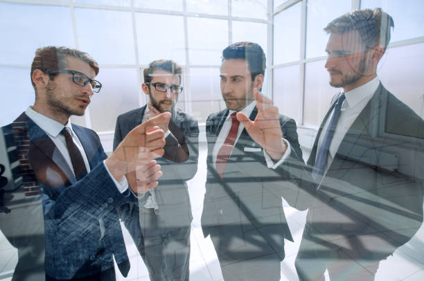 istock business partners are discussing a new commercial project 1011810402