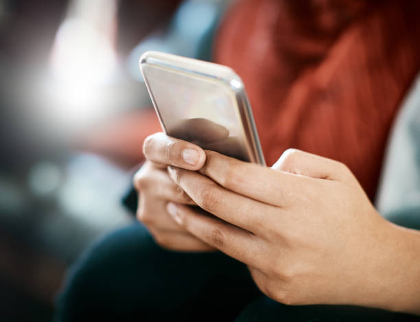 istock Female hands busy texting on mobile phone 1011836344