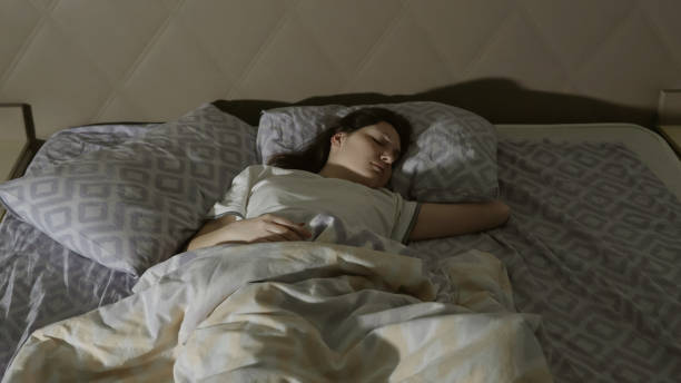 istock Restless dreams. A young woman has a nightmare 1011838604