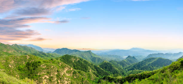 istock Green mountains and beautiful sky natural scenery 1011852542