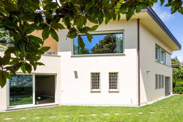 istock Villa with large garden during a summer day 1011853456