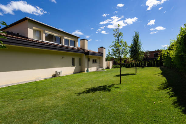 istock Villa with large garden during a summer day 1011853538
