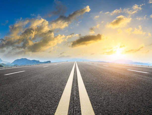 istock Straight asphalt highway and mountain natural landscape 1011856608