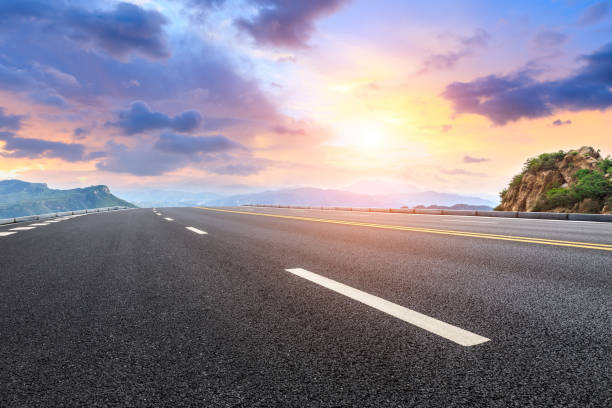 istock Empty asphalt highway and mountain natural landscape 1011857572