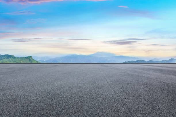 istock Asphalt square and mountain natural scenery 1011870908