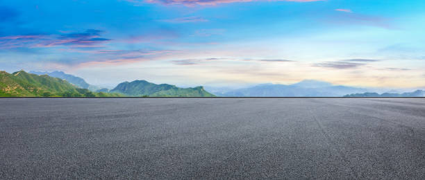 istock Asphalt square and mountain natural scenery 1011871708