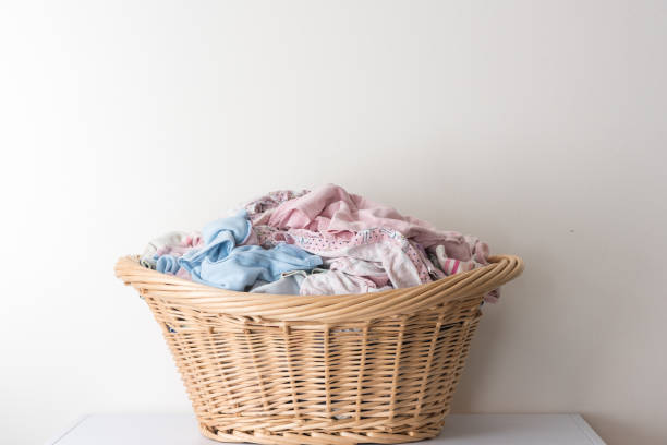 istock Wicker basket wtih blue and pink washing 1011872020