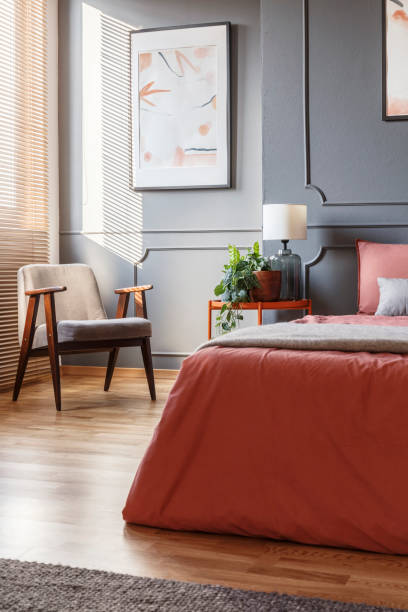 istock Poster in ginger bedroom interior 1011876318