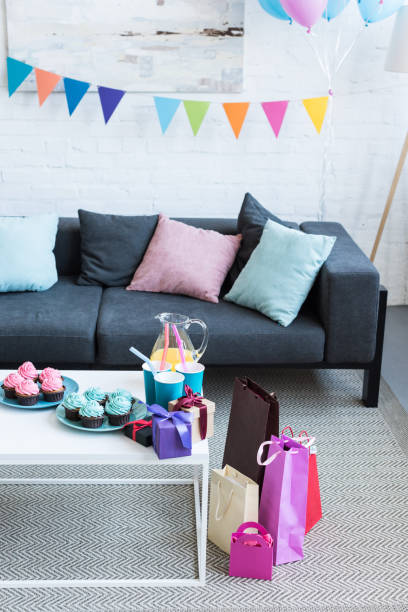 istock balloons and gift boxes in room, baby-party concept 1011904708
