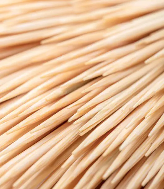 Photo of wooden toothpicks close-up