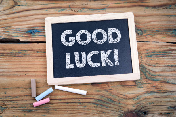 istock Good luck. blackboard and old wooden table 1011914856