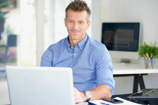 istock Businessman working on laptop at the office 1011923046