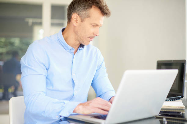 istock Businessman working on laptop at the office 1011923192