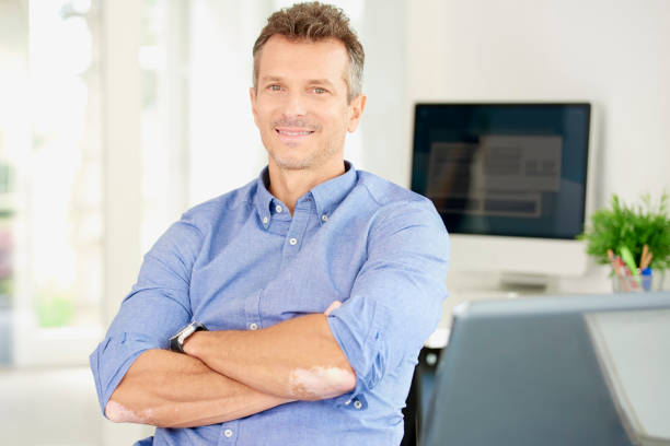 istock Businessman with folded arms 1011923776