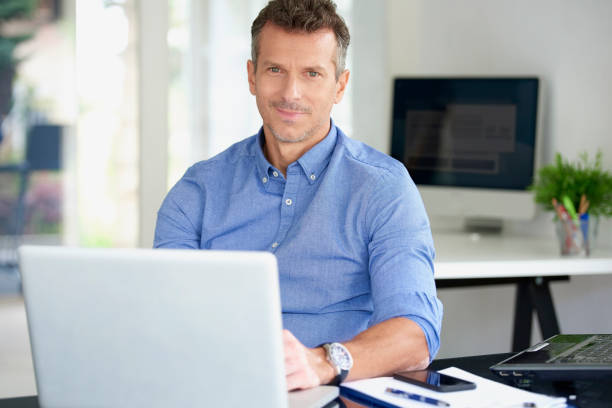 istock Businessman working on laptop at the office 1011923824