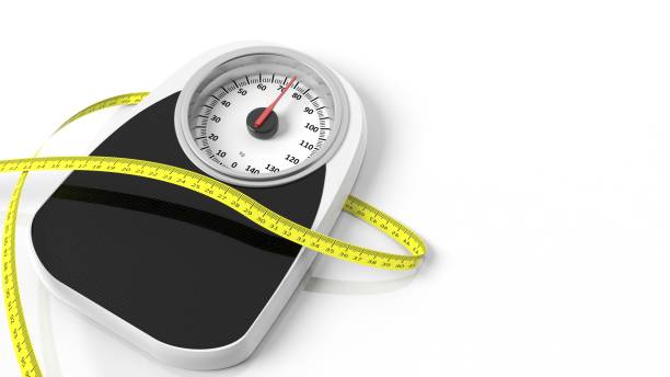 istock Bathroom scale with measuring tape, isolated on white background. 1011924354