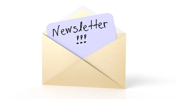 istock Open yellow envelope with Newsletter note, isolated on white. 1011926958