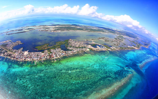 aerial view of san pedro town, ambergris caye, belize with barrier reef - san pedro imagens e fotografias de stock