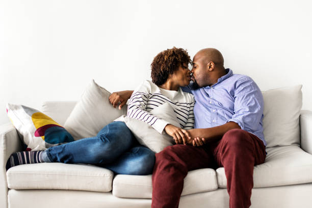 istock Happy couple relaxing at home 1011936026