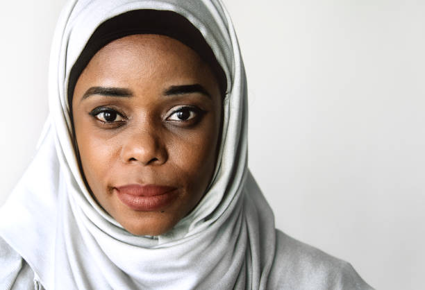 istock Islamic woman portrait looking at camera 1011936318