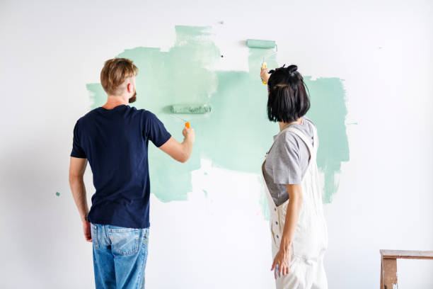 istock Couple renovating the house 1011940676