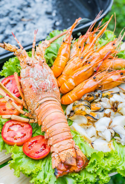 istock Seafood Menu Lobster and Shrimp and squid grill 1011950540