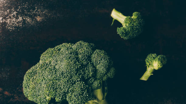 istock top view of green broccoli on grey dark table 1011950784