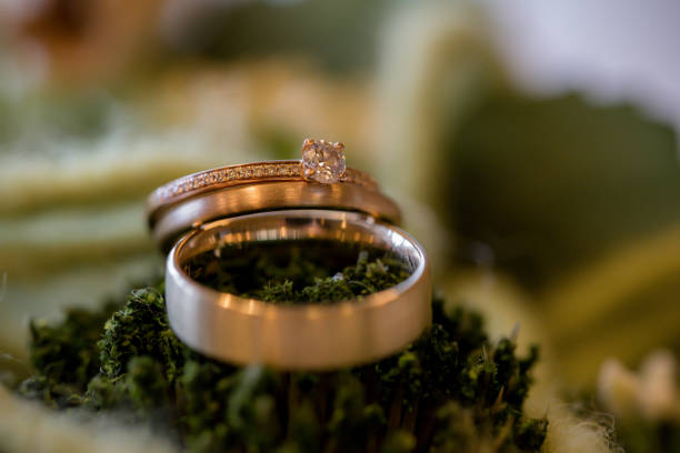 istock Wedding decoration and flowers with wedding rings 1011954786