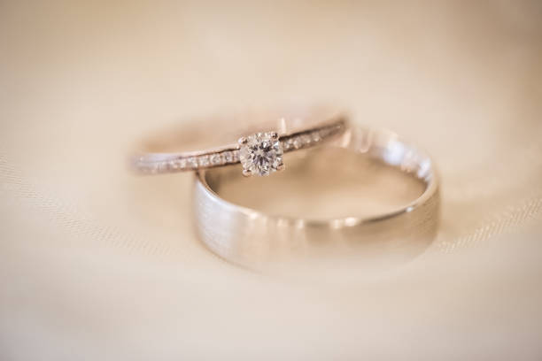 istock Wedding decoration and flowers with wedding rings 1011955278