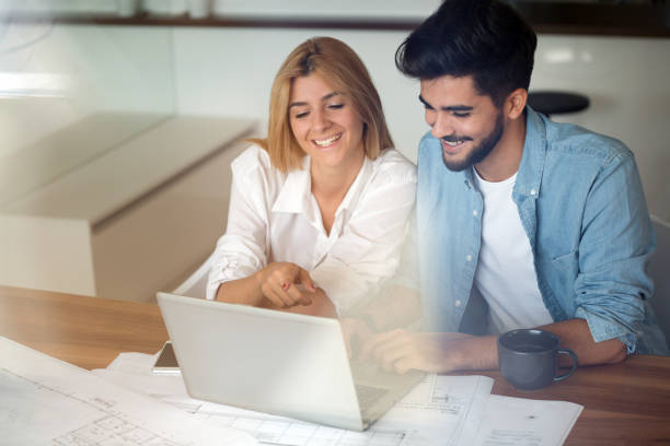 istock Business People and architects working on project together 1011960568