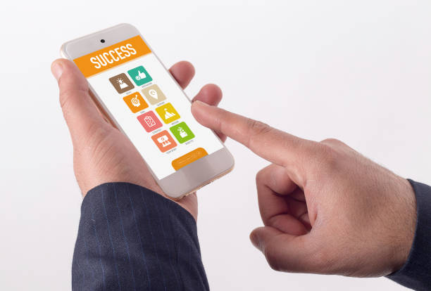 istock Man showing smartphone Success on screen 1011965104