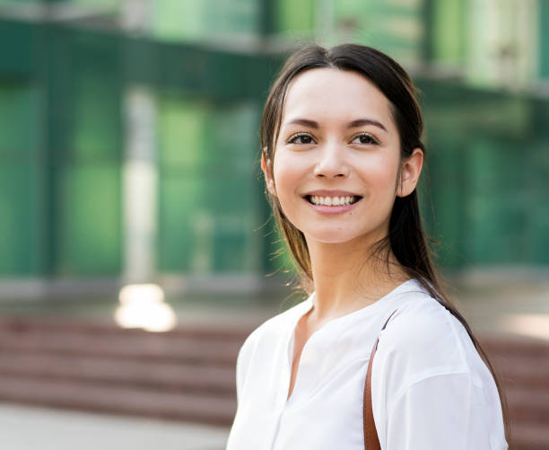 istock Beautiful Asian woman smiling 1011969940