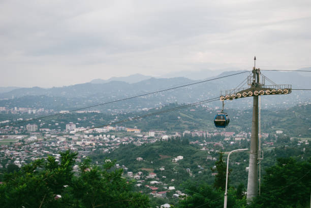 istock Cable car moving up the hill. 1011972098