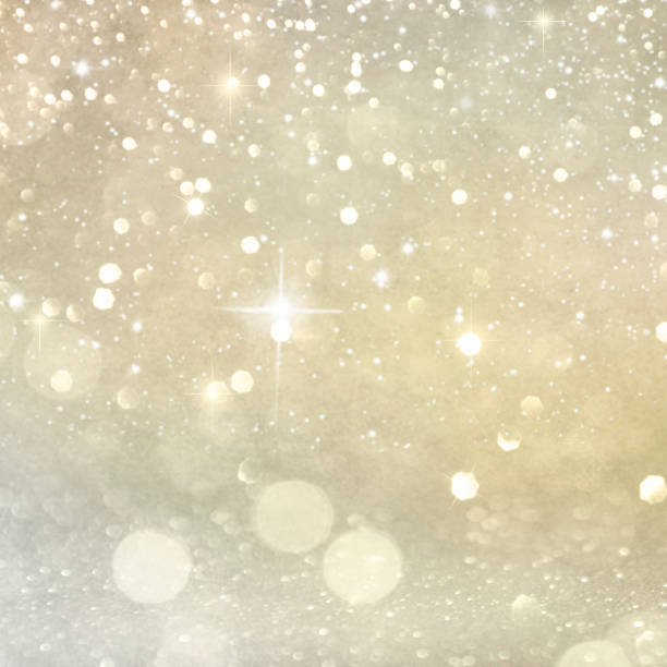 istock Christmas light background.  Holiday glowing backdrop. Defocused Background With Blinking Stars. Blurred Bokeh. 1011977378