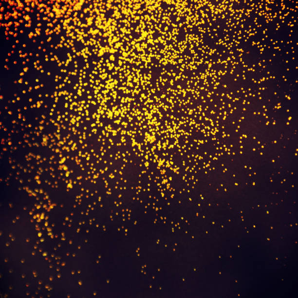 istock Gold glitter texture on a black background. Holiday background. 1011977668