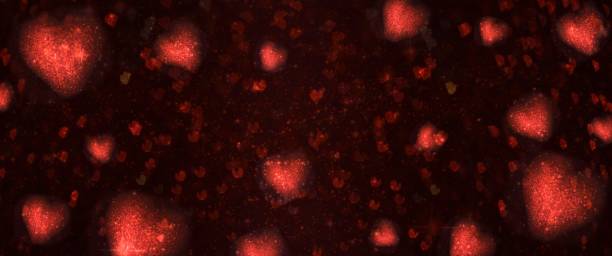 istock Valentines Day light background.  Holiday glowing backdrop. Defocused Background With Blinking Stars. Blurred Bokeh. 1011978948