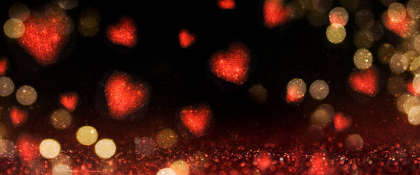 istock Valentines Day light background.  Holiday glowing backdrop. Defocused Background With Blinking Stars. Blurred Bokeh. 1011979070