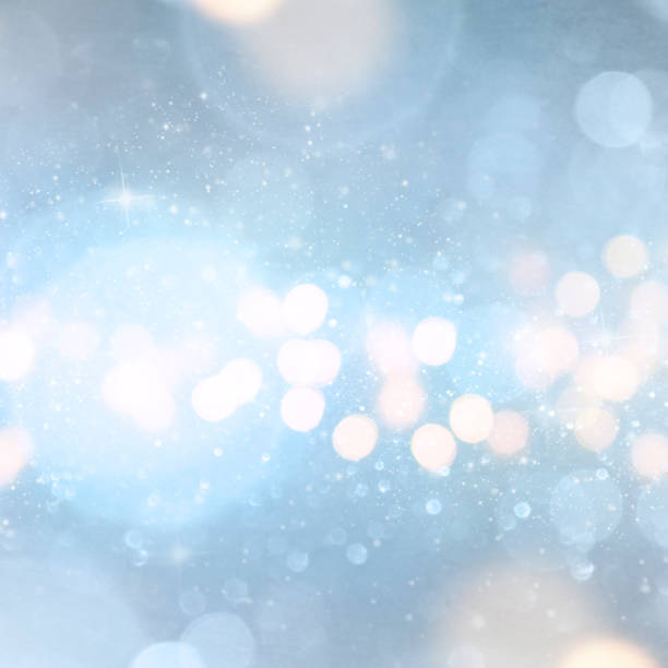 istock Christmas light background.  Holiday glowing backdrop. Defocused Background With Blinking Stars. Blurred Bokeh. 1011979512