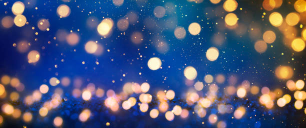 istock Christmas light background.  Holiday glowing backdrop. Defocused Background With Blinking Stars. Blurred Bokeh. 1011982174