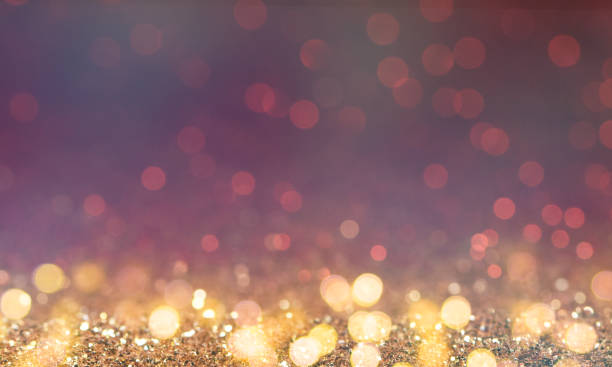 istock Christmas light background.  Holiday glowing backdrop. Defocused Background With Blinking Stars. Blurred Bokeh. 1011982548