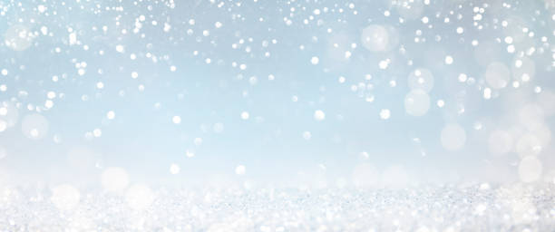 istock Christmas light background.  Holiday glowing backdrop. Defocused Background With Blinking Stars. Blurred Bokeh. 1011982632