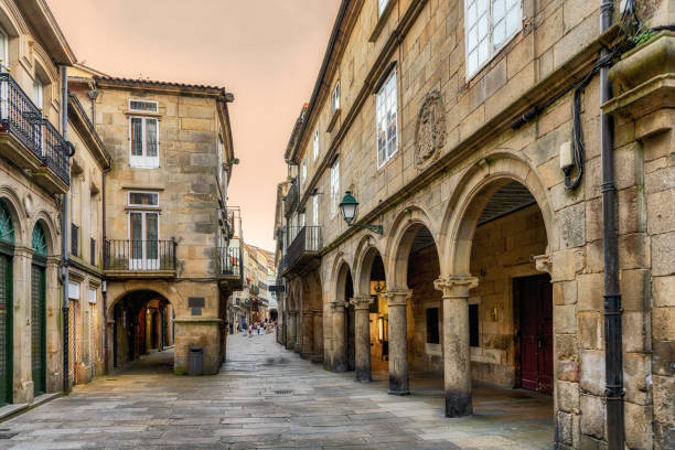 View of old town Santiago de Compostela, Spain. View of pedestrian street and building facades in old town Santiago de Compostela, Spain. santiago de compostela stock pictures, royalty-free photos & images